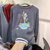 Estación Europea 2026 Otoño/Invierno Nuevo Estilo Coreano Cuello Redondo Suéter de Lana de Dibujos Animados para Mujer, Corte Holgado, Top de Punto que Reduce la Edad