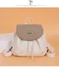 Mochila casual de gran capacidad con cierre de cordón, diseño de bloques de color, ligera, simple, adecuada para ir al trabajo y viajar, hecha de nailon, moderna