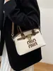 Bolsa Transversal de Ombro Único Versátil e Fashion para Mulheres 2026 Novo Modelo Bolsa de Mão de Design de Nicho de Alta Qualidade Bolsa Concha para o Dia a Dia