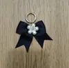 Laço de Cetim Preto Tecido à Mão Argola Metálica com Fecho de Mola Pingente para Decoração de Bolsa e Sapato DIY
