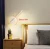 Lámpara de pared moderna simple nórdica para mesita de noche de dormitorio, creativa para escaleras, fondo de sala de estar, pasillo, lámpara de pared LED giratoria
