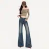 Jeans acampanados # Bordados color naranja joven con un bolsillo trasero, corte slim, favorecedores, desgastados, con caída fluida, modernos y versátiles
