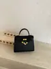 Bolso de Hombro Único con Textura de Alta Calidad para Mujer 2026 Nuevo Pequeño de Nicho Moda Bolso de Mano Simple Bolso Cruzado de Gran Capacidad
