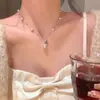 Collar de perlas de estornino retro francés para mujer, lujo ligero, sentido de alta gama de personalidad, cadena para el cuello de moda exquisita, cadena para la clavícula