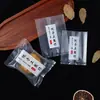 Saco de embalagem original para bolos da lua, biscoitos e lanches de confeitaria, com fundo branco transparente, margarida pequena, saco selado a máquina para bolos da lua