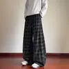 Pantalones de cuadros acampanados para hombre, primavera y otoño, estilo americano de alta calle, texturizados, diseño plisado, pantalones largos casuales de pierna ancha holgados