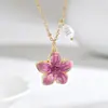 Collar de flores pequeñas de estilo Ins de lujo ligero para mujer, collar con colgante de perla, joyería coreana simple y a la moda, de temperamento dulce