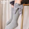 Calcetines de otoño e invierno para niños con lazo de color sólido rojo año nuevo calcetines de tubo calcetines de algodón de viento de princesa para niñas calcetines de baile al por mayor