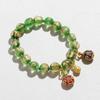 Pulsera de esmalte color gris fragante lámina de oro método antiguo perfecto tesoro múltiple bestia de oro golondrina pulsera del año de esta vida femenina estilo de corte al por mayor