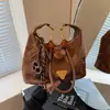Bolsas Femininas de Nicho de Alto Padrão 2026 Nova Coleção Primavera/Verão Versátil Bolsa Transversal Bolsa de Ombro Bolsa de Braço Bolsa Bolinho