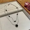 2025 Nova Corrente de Clavícula Flor de Design Nicho de Alta Qualidade com Pérolas em Forma de Coração Dupla Camada para Mulheres Joias Atacado