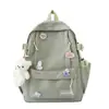 Mochila nueva y linda estilo coreano con colgantes, color liso, mochila juvenil para estudiante, versátil, moderna, dulce y casual