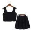 Nuevo conjunto de punto liso de verano para mujer, chaleco corto sin mangas de cuello cuadrado con borde ondulado y conjunto de dos piezas de falda midi de cintura alta