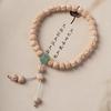 Pulsera de semillas de pasión de material vibratorio caliente 108 cuentas alta densidad alto contenido de aceite pulsera de semillas de ciprés del Tíbet bodhi natural literario