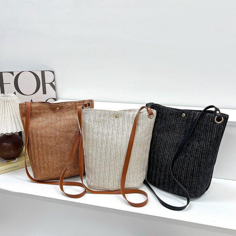编织包女包新款潮2024夏草编简约百搭小清新水桶包个性单肩斜