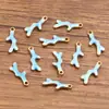 10 Colgantes de Acero Inoxidable Multicolor Dorado de Doble Cara con Goteo de Aceite para Peces, Cangrejos, Delfines, Corales, Caballitos de Mar DIY para Viajes de Commuting a la Moda