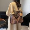 Bolso de mano retro de gran capacidad para mujer, bolso bandolera de un solo hombro, mochila ligera e informal, 2025