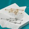 Transfronterizo 16G color acero inoxidable hueco en forma de corazón puente de oreja mariposa hueco cruz chapado doble agujero barra recta aretes