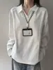 Camisa polo de manga longa patchwork estilo americano cinza claro para homens, silhueta de outono, caimento regular nos ombros, adequada como camada interna ou base, com gola de lapela