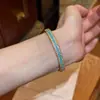 Pulseira estilo étnico retrô de cabaça dourada com imitação de turquesa para mulheres, joia de nicho de alta qualidade, versátil e luxuosa