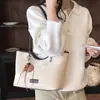 Bolso tote para mujer, nuevo modelo otoño e invierno 2026, bolso de hombro versátil de alta gama, bolso de hombro de gran capacidad para el trabajo