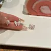 Pendientes de perla con diseño de mariposa de moda para mujer, diseño de nicho, alto sentido, novedad 2023, aguja de plata S925, clip para oreja de tendencia, venta al por mayor