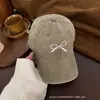 Gorra de béisbol con lazo para mujer, nueva moda primavera/verano, gorra de visera versátil bordada, sombrero de protección solar para hombre, casual y versátil