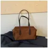 Bolsa de pão de pelúcia retrô de grande capacidade transfronteiriça nova versão coreana para mulheres bolsa de axila para deslocamento preguiçoso bolsa de ombro único de grande capacidade moderna