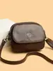 Bolsa de Ombro Fashion Texturizada 2025 Nova Simples Elegante Pequena Redonda Feminina Multicamadas Versátil Bolsa Transversal Tendência Transfronteiriça
