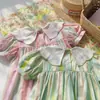 Vestido de niña con cuello Peter Pan, lazo bordado y manga corta, estilo verano 2026, rayas coloridas, dulce vestido de princesa, versión coreana