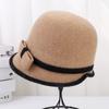 Nueva moda cálida de otoño e invierno para mujer al aire libre gorra ecuestre de lana pura coreana sombrero tipo cuenca con lazo venta al por mayor