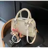 Bolso Pequeño de Alta Gama para Mujer 2025 Nuevo Primavera y Verano Versátil Bolso de Hombro Cruzado Estilo Caliente Súper Popular Bolso Cuadrado Pequeño de Mano