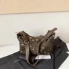 Estilo perezoso bolso pequeño plisado estampado de leopardo para mujer 2026 nuevo bolso de mano retro otoño e invierno sensación de alta gama bolso cruzado con correa ancha