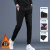 Envío RápidoPantalones de hombre con forro polar de invierno, con cremallera lateral, múltiples bolsillos, cintura alta elástica, corte holgado, pants deportivos, pantalones de deporte