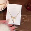 Colar de Pedra Olho de Gato Estilo Coreano com Laço para Mulheres, Corrente de Clavícula Exquisita e de Alto Padrão em Aço Titânio, Novo Acessório Versátil e Estiloso