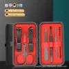 Set de Cortauñas Transfronterizo Negro y Rojo 24 Piezas Cortauñas Herramienta de Manicura Set Completo Limpiaorejas Cortauñas Portátil