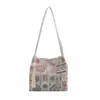 Bolso casual de diseño nicho para mujer, nuevo bolso de hombro de moda de verano, bolso de axila elegante, moderno y único 2026
