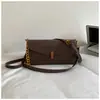 Bolso niche para mujer Shuai Mi Jia 2026 verano nuevo moderno elegante bolso de hombro cruzado bolso de axila para el trabajo moderno