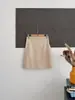 Conjunto de dos piezas top strapless de manualidad con flor móvil falda de media longitud ajustada a la cadera de manualidad de cuatro planos blanco puro talla única algodón color liso
