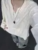 Camiseta de cuello en V de manga larga desgastada de gama alta para hombre, nuevo estilo primavera/otoño, escote pronunciado, diseño inspirado en el páramo, corte holgado, casual, top versátil