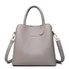 Bolsos de mano para mujer al por mayor para comercio exterior 2022 nuevos modelos estilo coreano versátil bandolera cruzada tote bag bolso de mano de gran capacidad