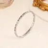 Pulsera Popular de Diseño de Nicho Transfronterizo de Acero de Titanio con Números Romanos Incrustados de Diamantes para Mujer, Pulsera de Pareja de Alta Gama y que No se Desvanece
