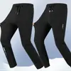 Calças casuais masculinas de outono e inverno, calças de perna reta estilo jogger, corte solto, versáteis, com bolsos, zíper, antifurto, calças esportivas para homens