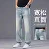 Calças jeans azuis leves de alta qualidade italianas para o verão para homens, calças casuais de negócios de corte reto soltas, calças da moda