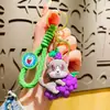 Boneca de cachorro de madeira de fruta de segunda geração criativa fofa desenho animado chaveiro de carro pingente de bolsa presentes pequenos para casais atacado