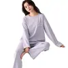 Pijama de algodón elástico de manga larga y pantalón largo de otoño, nuevo al por mayor para mujer, cuello redondo, se puede usar en el exterior, conjunto de dos piezas para el hogar