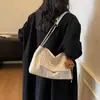 Bolso de Gran Capacidad para Mujer bajo el Brazo 2025 Nuevo Estilo Bolso de Mano Minimalista Francés Texturizado Bolso de Hombro con Cadena Moda Venta al por Mayor