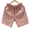 Shorts Esportivos Masculinos de Secagem Rápida Novos para o Verão de 2026, Corte Solto, Marca Tendência, Shorts Casuais Versáteis de Cor Sólida para Jovens