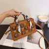 Bolso cuadrado pequeño, simple, moderno y único, bolso de hombro nuevo y de moda con textura, bolso cruzado simple de estilo coreano para mujer, verano 2026
