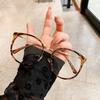 Armazón de gafas para miopía Qianai Nuevo Estilo K Retro Redondo Gafas de Luz Anti-Azul Tr Oro Pegamento Mixto Espejo Plano